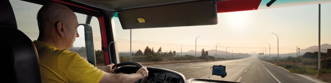 truck driver driving on empty road